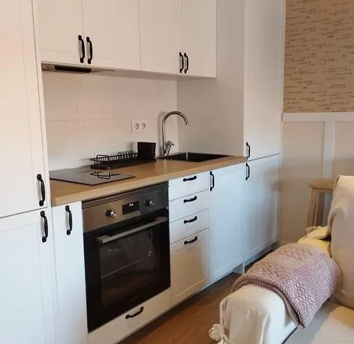 Mc Lagos, Bueu Apartmán *